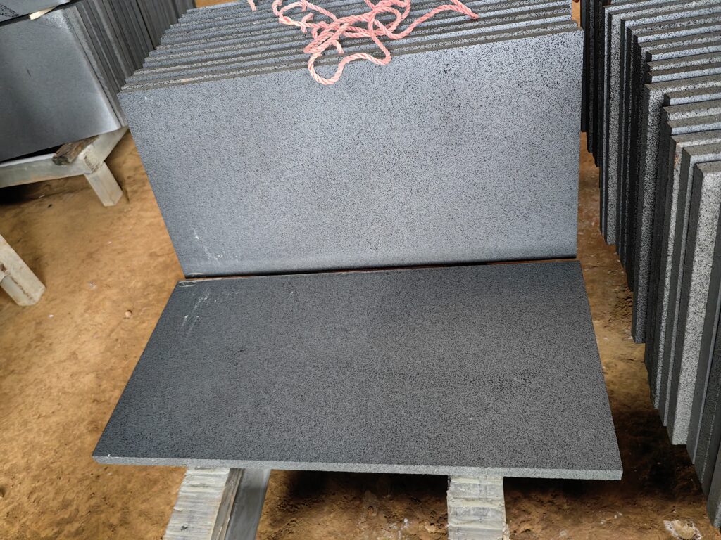 Garden walkway made with rectangular bluestone pavers